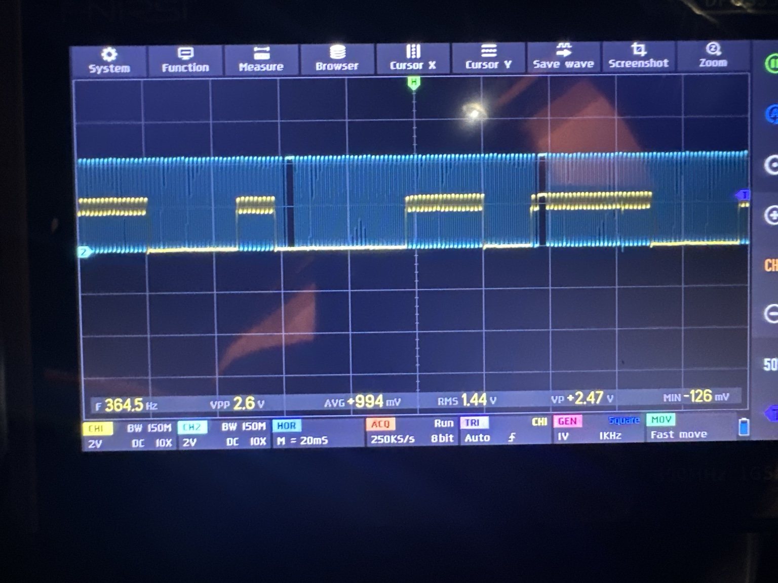 Two channel oscilloscope capture while cranking, blue crankshaft signal switching at 364.5 hertz with the yellow camshaft signal above it, 2.6 volts peak to peak