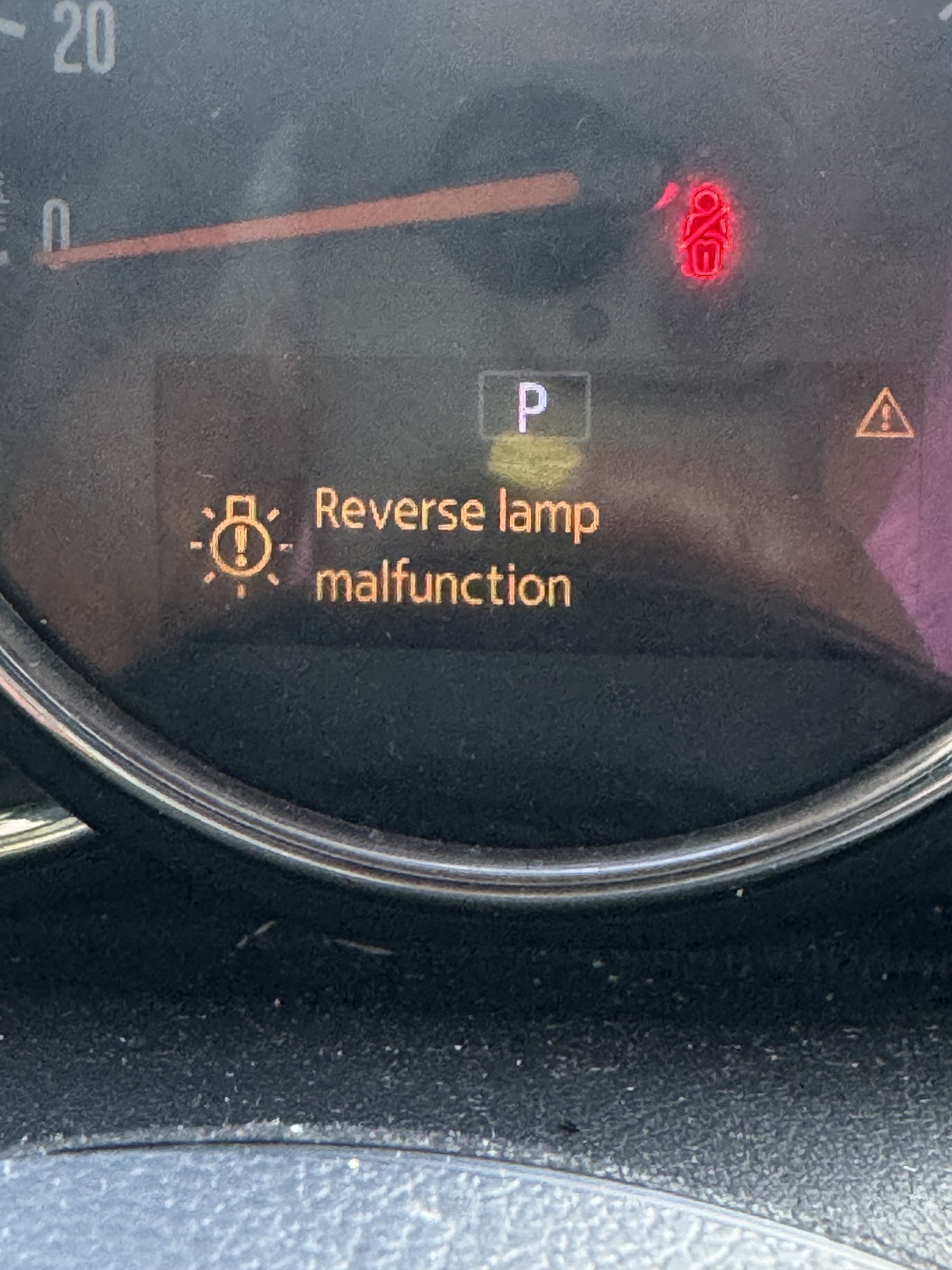 MINI instrument-cluster message reading Reverse lamp malfunction beside the rear-light warning icon
